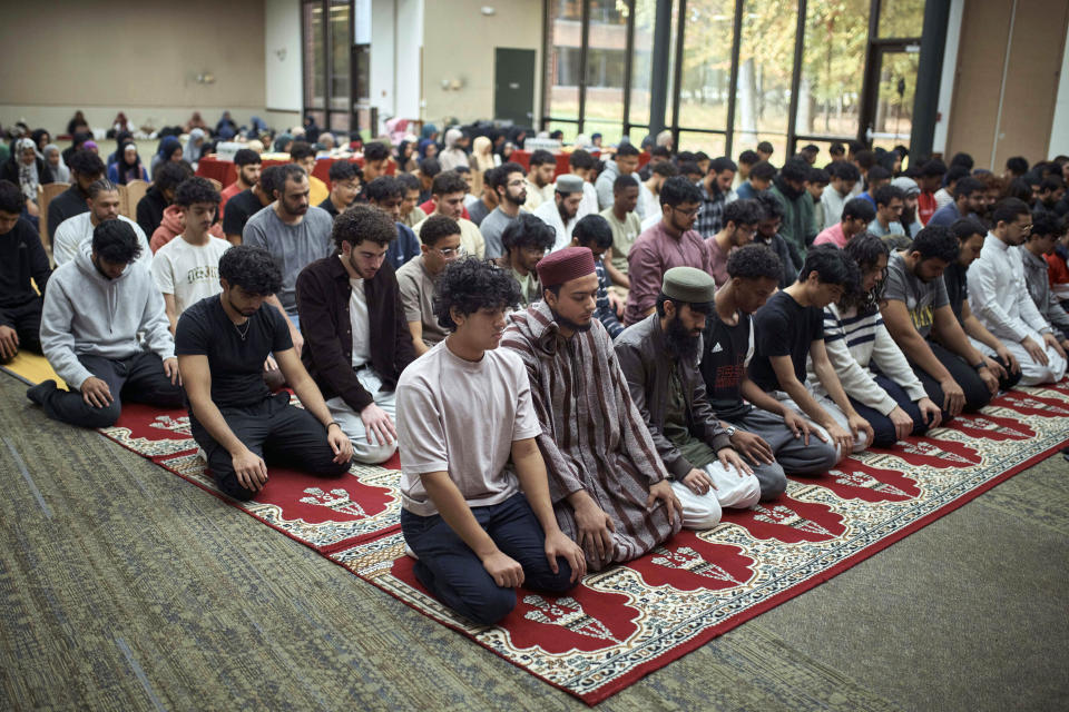 Muslim Rutgers University's students pray on Friday, Oct. 27, 2023, in New Brunswick, N.J. For many of the university chaplains and faith leaders caring for students angered and shaken by the Israel-Hamas war, the needs are acute, the days intense. The bloodshed has roiled campuses in the United States, sparking rival rallies and competing demands.(AP Photo/Andres Kudacki)