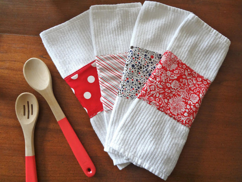 Their kitchen will look brighter with these pretty, <a href="http://www.huffingtonpost.com/2012/04/11/craft-of-the-day-embellished-dishtowels_n_1415075.html?1350329605">embellished dish towels</a>.