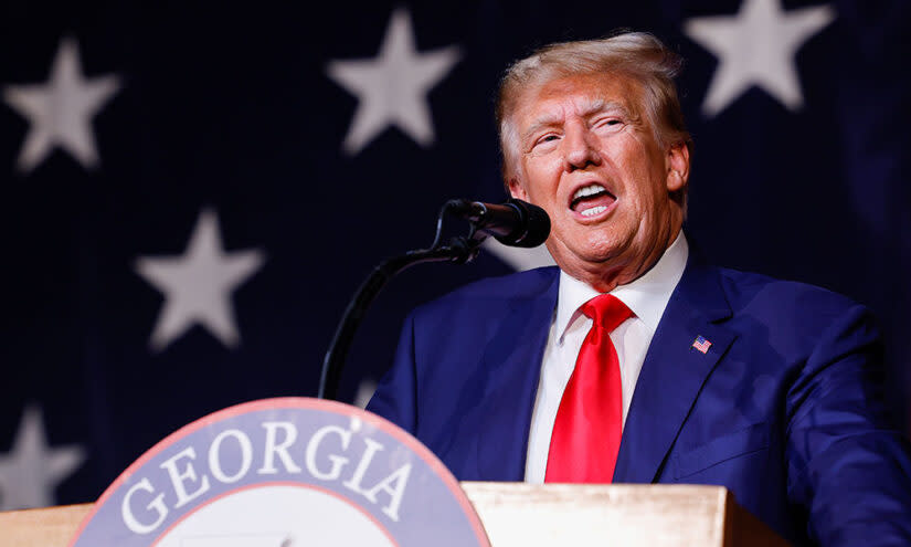 Former President Donald Trump at the Georgia state GOP convention on June 10, 2023. Fani Willis, the prosecutor who is pursuing the Georgia election case, made a name for herself a decade ago by pursuing similar racketeering charges against Atlanta educators. (Anna Moneymaker/Getty Images)