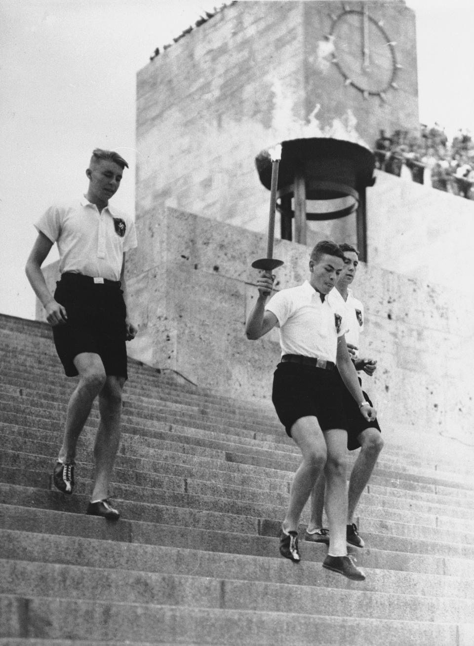 The 1936 Summer Olympics were the first to feature a torch relay. (AP)