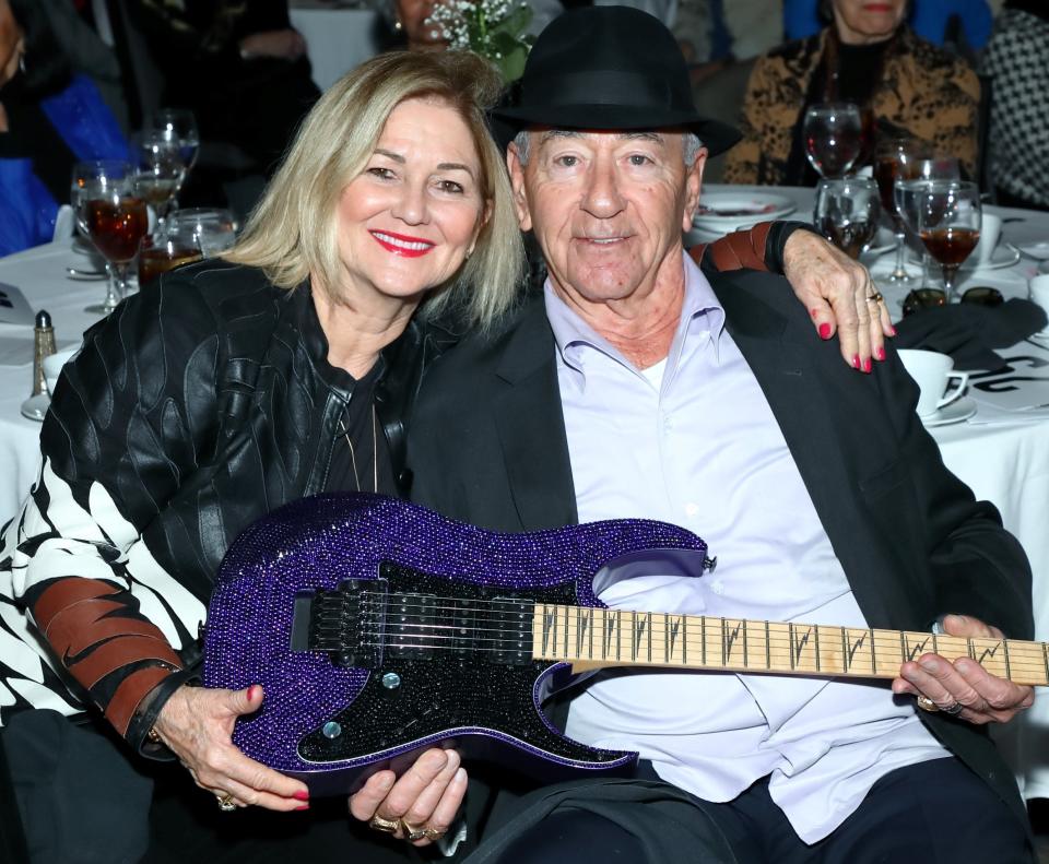 Debbie and Rocky Dilucchio won this Swarovski crystal guitar in the live auction at Mama's House's annual Heartbeat of Love luncheon, Feb. 10, 2024.