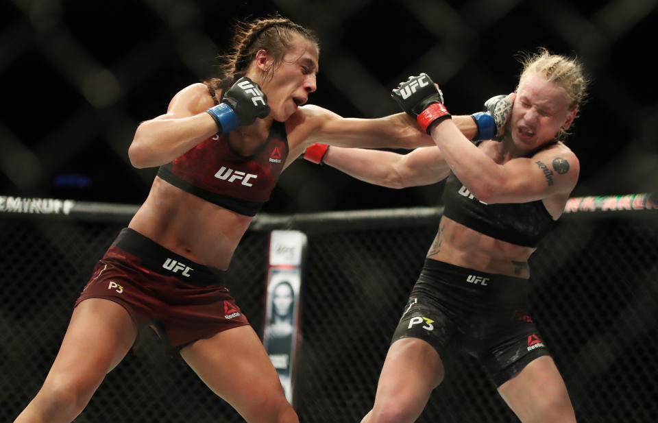 TORONTO, ON- DECEMBER 9  -   Valentina Shevchenko, right, trades blows with Joanna Jedrzejczyk at  UFC 231  at  Scotiabank Arena.  Shevchenko would win the UFC Flyweight Championship in Toronto. December 9, 2018.        (Steve Russell/Toronto Star via Getty Images)