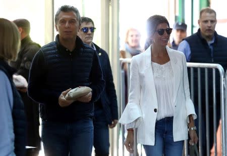 Argentina's President Mauricio Macri and First Lady Juliana Awada arrive at a polling station in Buenos Aires, Argentina October 22, 2017. REUTERS/Marcos Brindicci