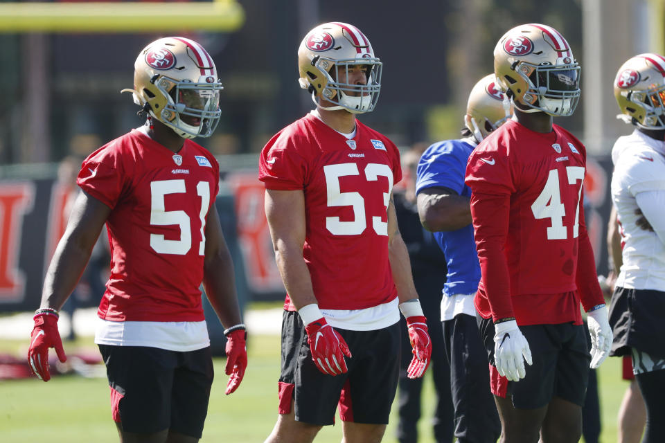 San Francisco 49ers linebackers Azeez Al-Shaair (51) Mark Nzeocha (53), of Germany, and Elijah Lee (47) line up during practice, Thursday, Jan. 30, 2020, in Coral Gables, Fla., for the NFL Super Bowl 54 football game. (AP Photo/Wilfredo Lee)