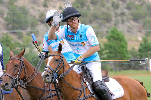 <p>Chris Jackson/Getty</p> Prince Harry plays polo in 2022