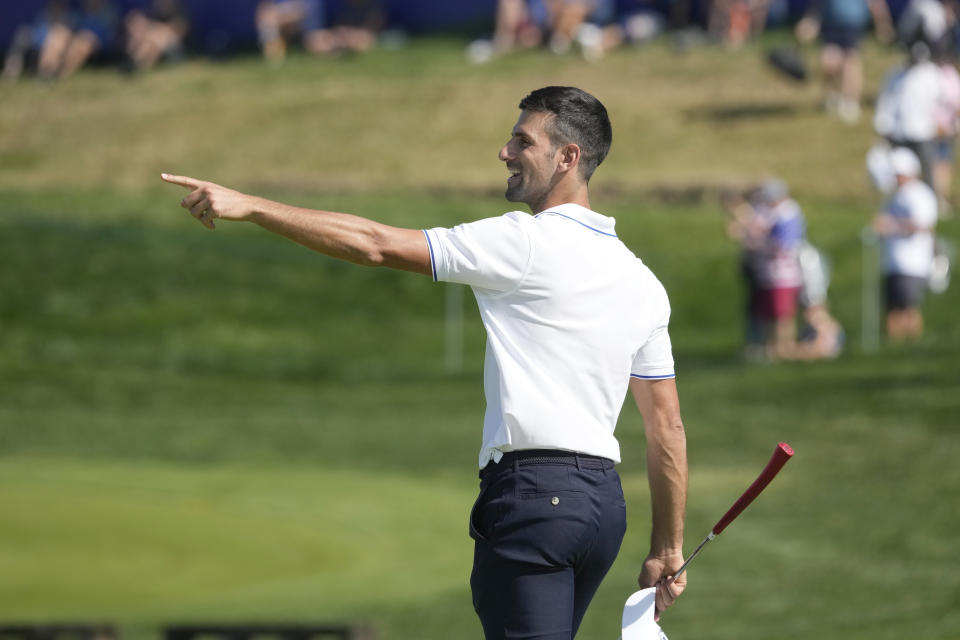 Tennis player Novak Djokovic gestures after putting on the 16th green during an all stars golf match between Team Colin Montgomerie and Team Cory Pavin at the Marco Simone Golf Club in Guidonia Montecelio, Italy, Wednesday, Sept. 27, 2023. The Ryder Cup starts Sept. 29, at the Marco Simone Golf Club. (AP Photo/Andrew Medichini)