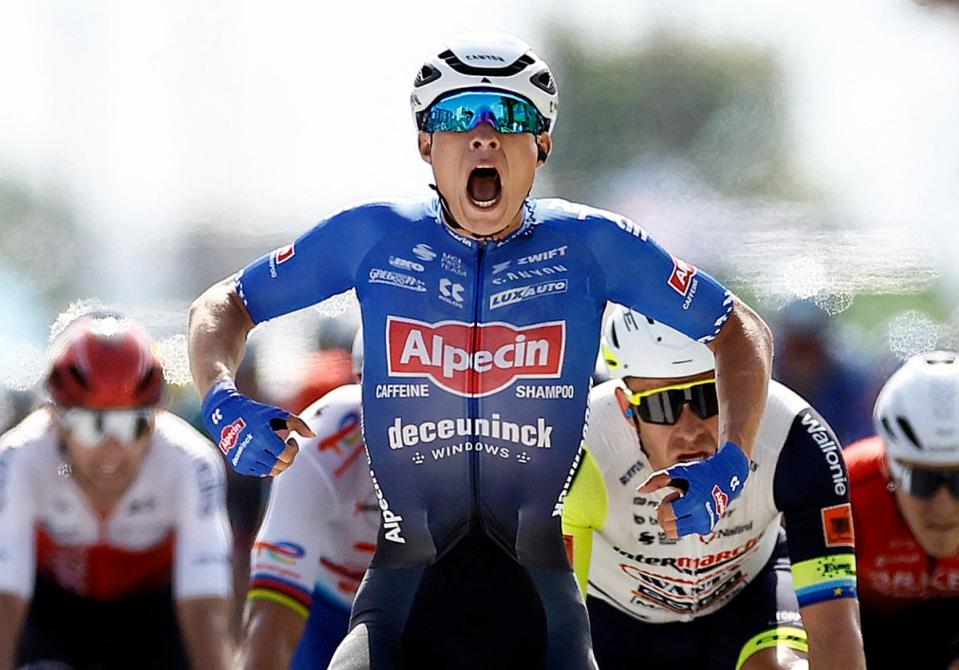 Jasper Philipsen celebrates, thinking he has won stage four (REUTERS)