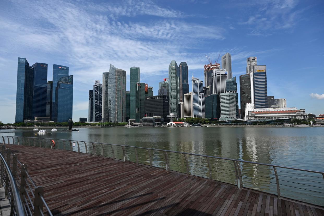 A general view along Marina Bay promenade shows the city skyline in Singapore on March 31, 2021. (Photo by Roslan RAHMAN / AFP) (Photo by ROSLAN RAHMAN/AFP via Getty Images)