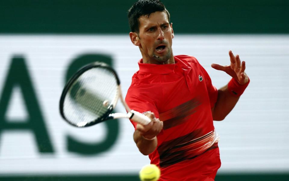 Novak Djokovic of Serbia plays Rafael Nadal of Spain in their men's quarterfinal match during the French Open tennis tournament at Roland Garros -  MOHAMMED BADRA/EPA-EFE/Shutterstock