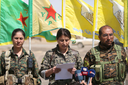 Jihan Sheikh Ahmed (C), the official spokesperson of the Raqqa campaign, talks during a conference, east of Raqqa city, Syria March 26, 2017. REUTERS/Rodi Said