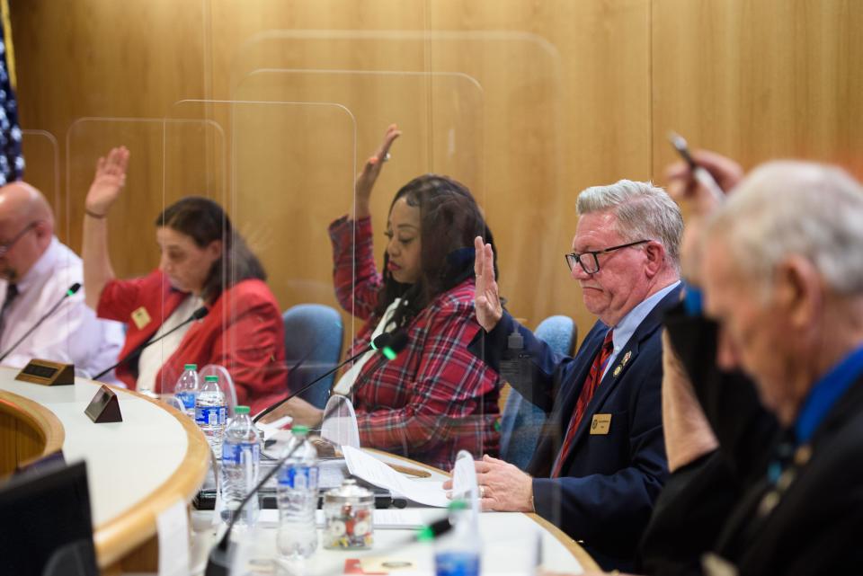 Hope Mills' new mayor Jessie Bellflowers, second from right, leads a Board of Commissioners meeting on Monday, Dec. 4, 2023, at Hope Mills town hall.