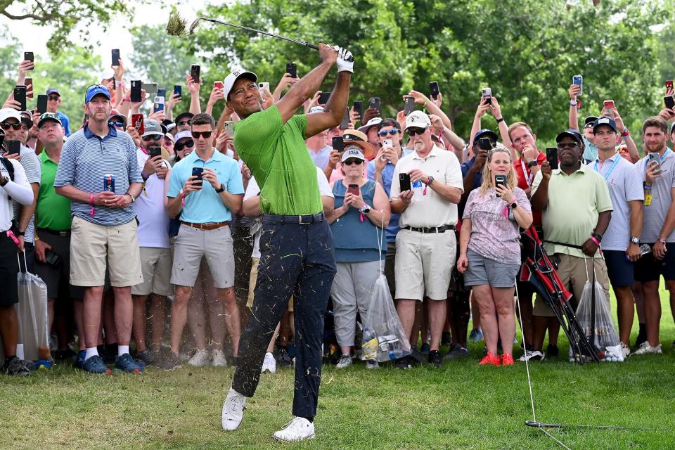 Tiger Woods plays his second shot on the first hole during the second round of the 2022 PGA Championship