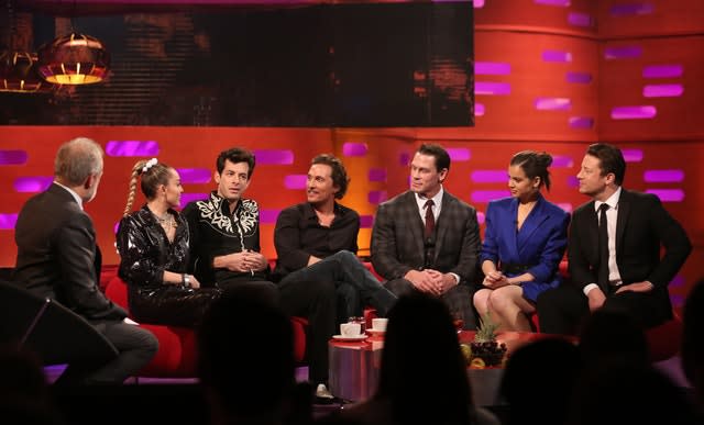 (left to right) Host Graham Norton, Miley Cyrus, Mark Ronson, Matthew McConaughey, John Cena, Hailee Steinfeld, and Jamie Oliver filming for The Graham Norton Show