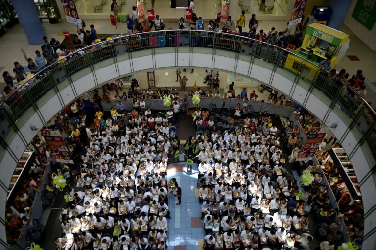 A mass wedding held inside a shopping center in Manila, Philippines, on June 21, 2015