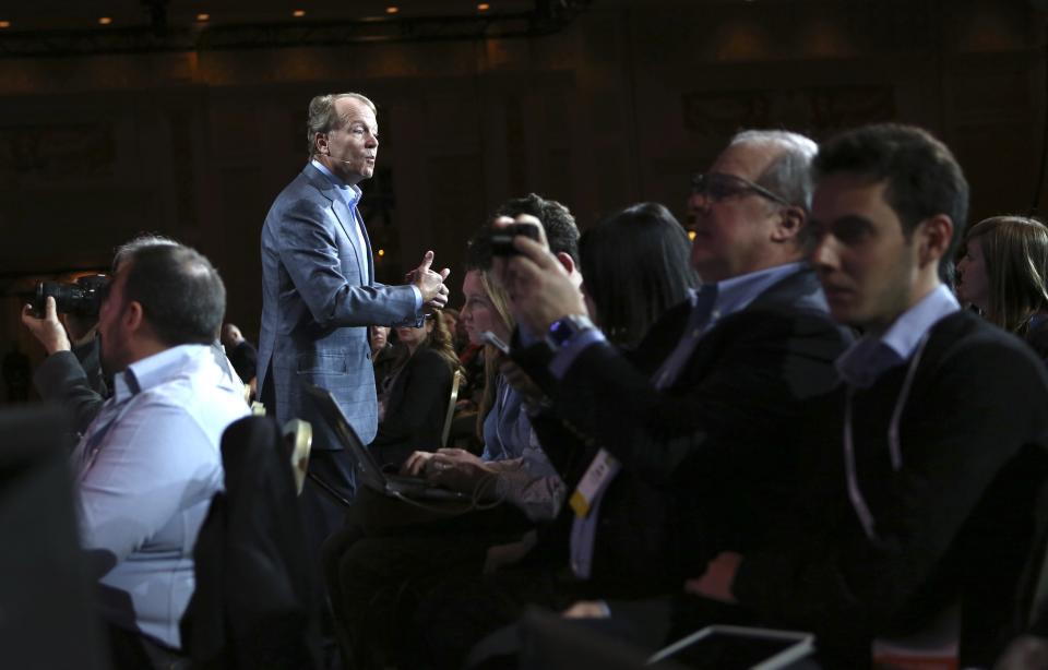 Cisco CEO John Chambers walks among the crowd while delivering his keynote speech at the annual Consumer Electronics Show (CES) in Las Vegas