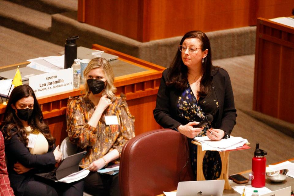 State Sen. Katy Duhigg, top right, D-Albuquerque, guides an hours-long debate on a bill that would shore up abortion access statewide amid a flurry of local anti-abortion ordinances, Tuesday, March 7, 2023, at the Capitol building in Santa Fe, N.M. A 23-15 vote of the Senate nearly ensures the bill will reach the desk of supportive Democratic Gov. Michelle Lujan Grisham. New Mexico has one of the country's most liberal abortion access laws, but two local counties and three cities have recently adopted abortion restrictions that reflect deep-seated opposition to the procedure.