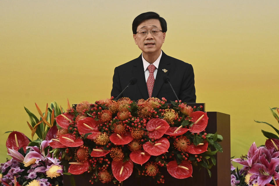 Hong Kong's new Chief Executive John Lee gives a speech following a swearing-in ceremony to inaugurate the city's new government in Hong Kong Friday, July 1, 2022, on the 25th anniversary of the city's handover from Britain to China. (Selim Chtayti/Pool Photo via AP)