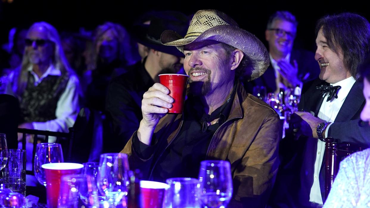 Toby Keith toasts with a red solo cup