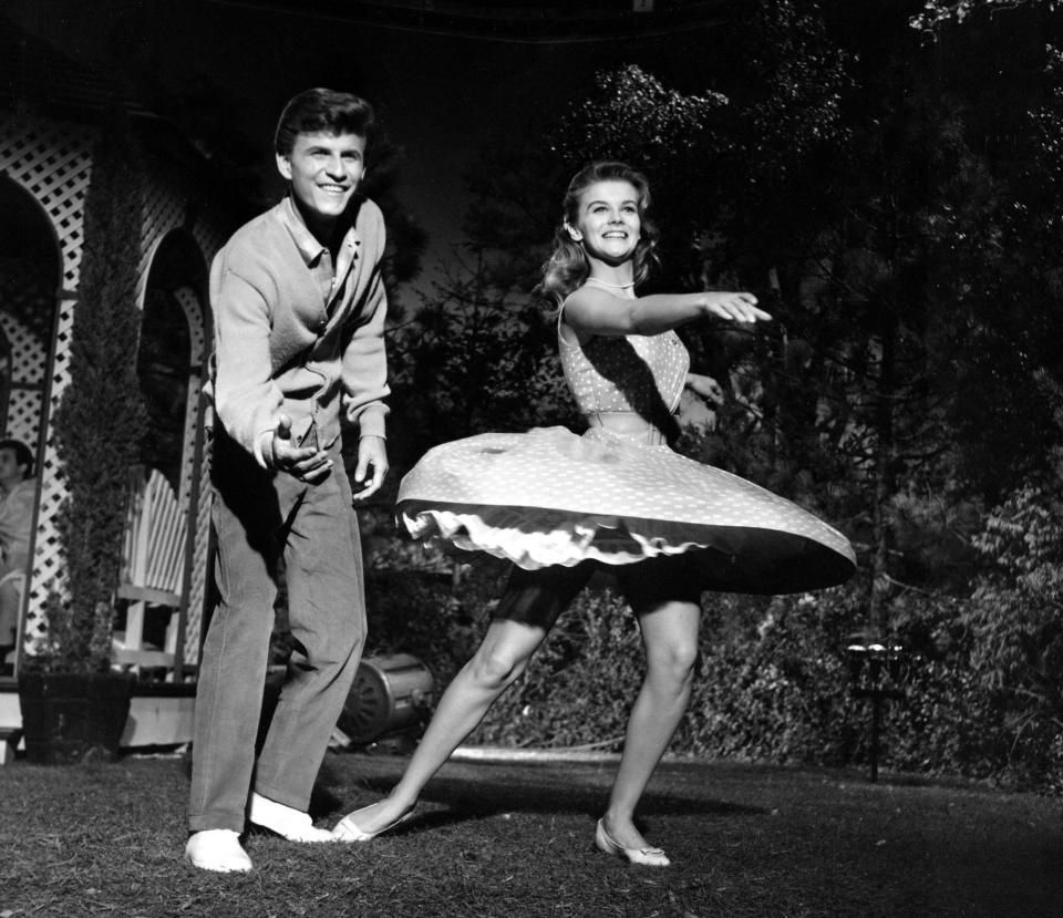 Ann-Margret, right, and Bobby Rydell dance during a scene from “Bye Bye Birdie” on the movie set in Hollywood, Ca., Sept. 14, 1962. It was the first film for actor-singer Bobby, 20, and the second for actress Ann-Margret, 21. (AP Photo) - Credit: ASSOCIATED PRESS