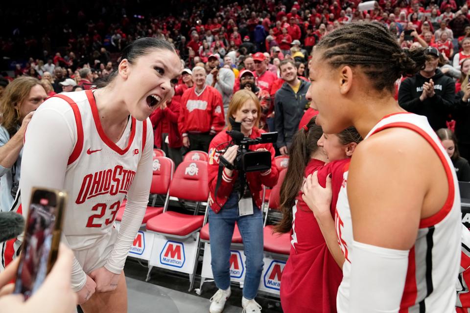 Jan 21, 2024; Columbus, Ohio, USA; Ohio State Buckeyes forward Rebeka Mikulasikova (23) celebrates with guard Rikki Harris (1) following the NCAA women’s basketball game against the Iowa Hawkeyes at Value City Arena. Ohio State won 100-92.