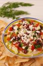 <p>Grab some pita chips and go to town.</p><p>Get the recipe from <a href="https://www.delish.com/cooking/a19645756/loaded-greek-hummus-recipe/" rel="nofollow noopener" target="_blank" data-ylk="slk:Delish;elm:context_link;itc:0;sec:content-canvas" class="link ">Delish</a>.</p>