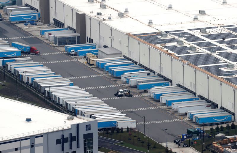 Amazon.com trucks are seen at an Amazon warehouse in Staten Island in New York City