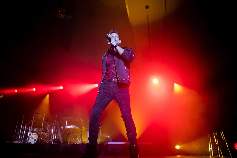 Stark County native Jeff Timmons performs with the band 98 Degrees in front of a sold-out crowd at the Hard Rock Casino Cincinnati on Dec. 17, 2021.