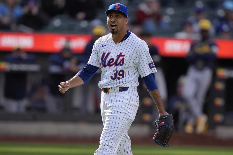 New York Mets relief pitcher Edwin Diaz (39) celebrates after striking out Milwaukee Brewers' Jackson Chourio during the ninth inning of a baseball game, Saturday, March 30, 2024, in New York. (AP Photo/Frank Franklin II)