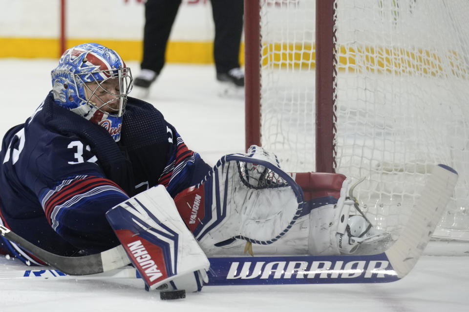 New York Rangers goaltender Jonathan Quick makes a save against the Anaheim Ducks during the third period of an NHL hockey game Friday, Dec. 15, 2023, in New York. (AP Photo/Seth Wenig)