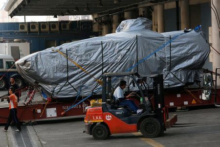 One of nine Terrex armoured vehicles, which belong to Singapore, waits to be loaded onto a truck at a cargo terminal in Hong Kong, China January 26, 2017. REUTERS/Bobby Yip/Files