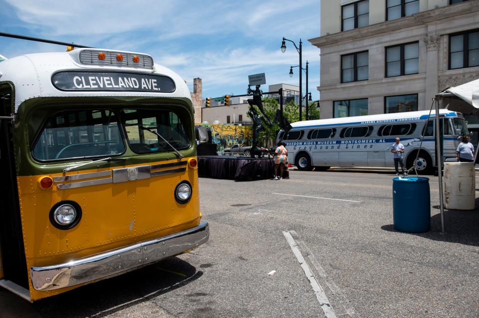 Guests can tour historic buses during the Juneteenth celebration outside the Rosa Parks Museum on June 17.,