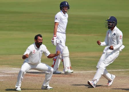 Cricket - India v England - Second Test cricket match - Dr. Y.S. Rajasekhara Reddy ACA-VDCA Cricket Stadium, Visakhapatnam, India - 21/11/16. India's Mohammed Shami celebrates with team mates the dismissal of England's Joe Root. REUTERS/Danish Siddiqui