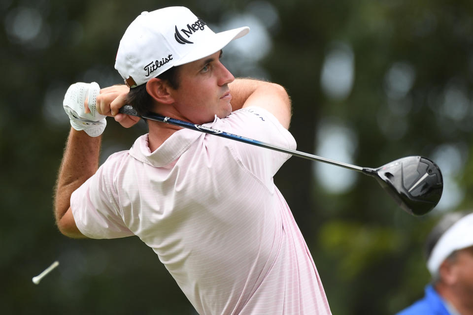 J.T. Poston watches his tee shot on the seventh hole during the third round of the FedEx St. Jude Championship golf tournament. Mandatory Credit: Christopher Hanewinckel-USA TODAY Sports