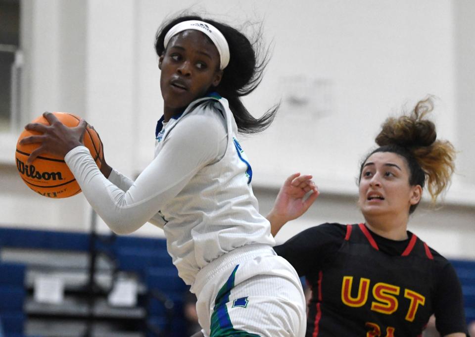 Texas A&M-Corpus Christi's Alecia Westbrook passes the ball against University of St. Thomas, Wednesday, Nov. 17, 2021, at Dugan Wellness Center.  The Islanders won, 79-38.