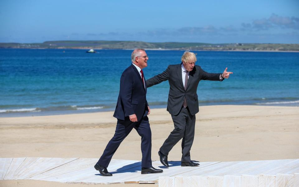 Boris Johnson welcomes Mr Morrison during the G7 Summit in Carbis Bay, Cornwall - Hollie Adams/POOL/EPA-EFE/Shutterstock 