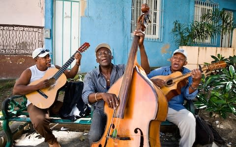 Street musicians in Santiago de Cuba - Credit: Getty