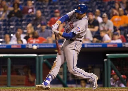 Apr 11, 2017; Philadelphia, PA, USA; New York Mets first baseman Lucas Duda (21) hits a home run during the ninth inning against the Philadelphia Phillies at Citizens Bank Park. The New York Mets won 14-4. Mandatory Credit: Bill Streicher-USA TODAY Sports