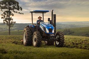 Farmer Fernando Dalmolin operating the accessible tractor mobile armchair device