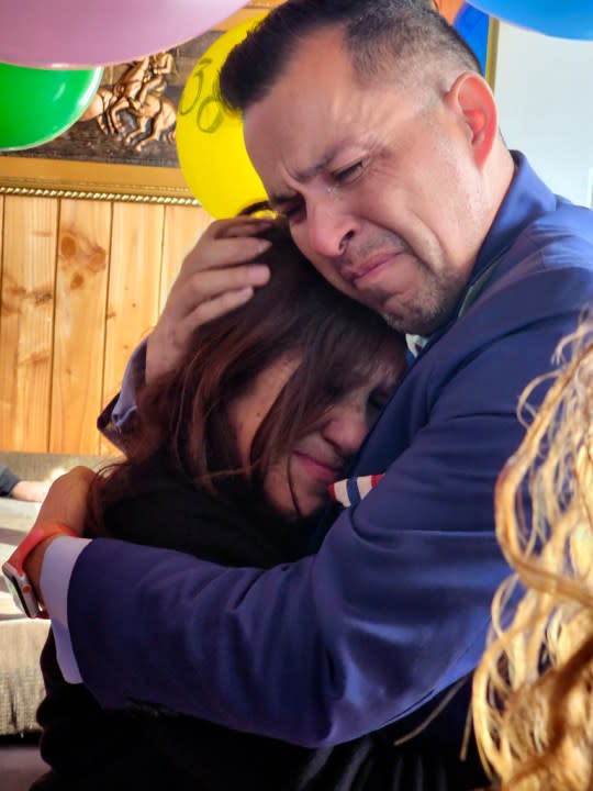 In this image provided by Constanza Del Rio/Nos Buscamos, Jimmy Thyden, right, hugs Maria Angelica Gonzalez, his Chilean birth mother, as they meet for the first time in Valdivia, Chile on Thursday, Aug. 17, 2023. For months Thyden has been on a journey to uncover the mysteries of his counterfeit adoption, and to reconnect with his biological mother, brothers and sister. (Constanza Del Rio/Nos Buscamos via AP)