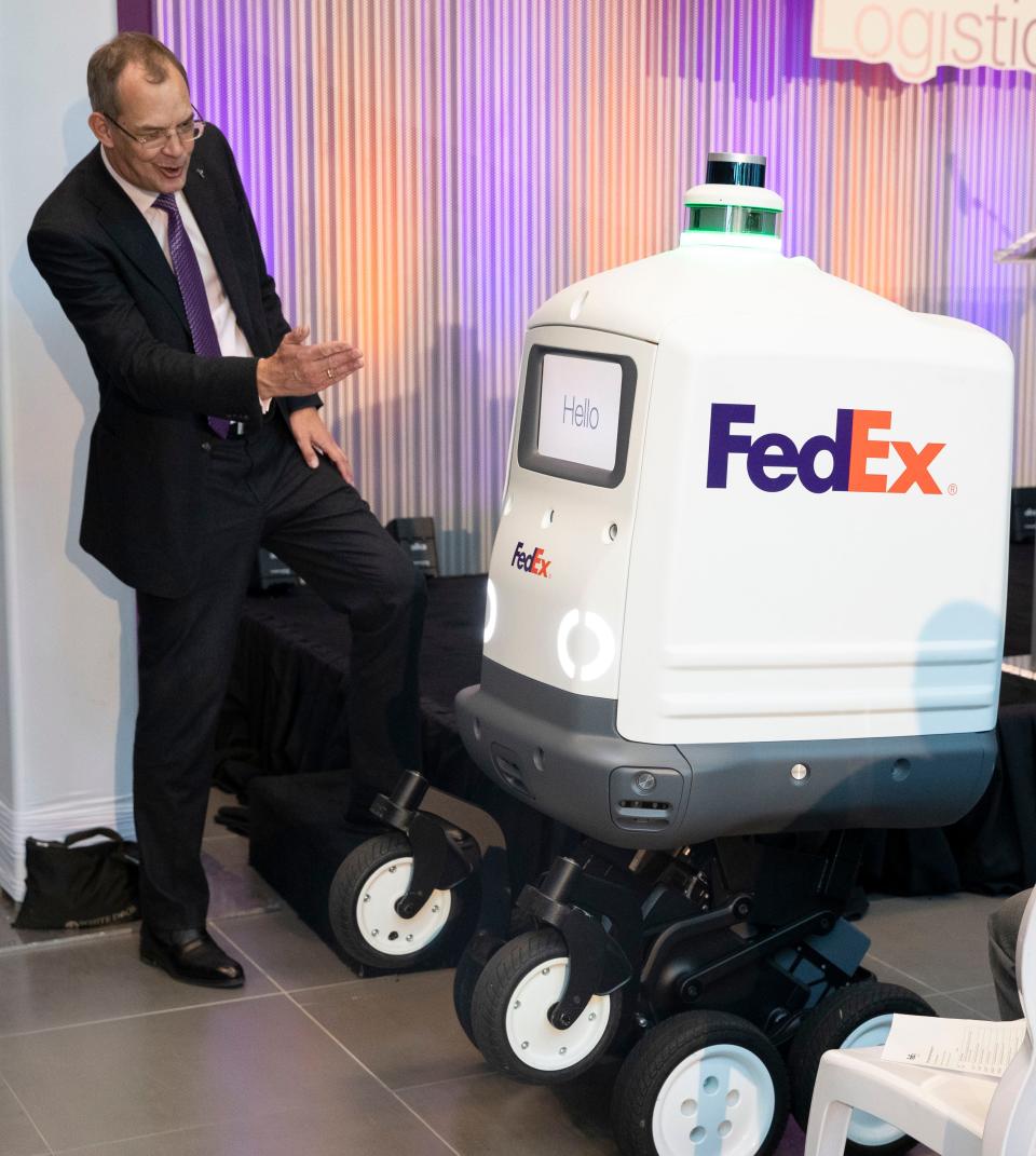 A FedEx robot, called Roxo, rolls out during the grand opening for the new FedEx Logistics headquarters on April 5, 2022, in Memphis.