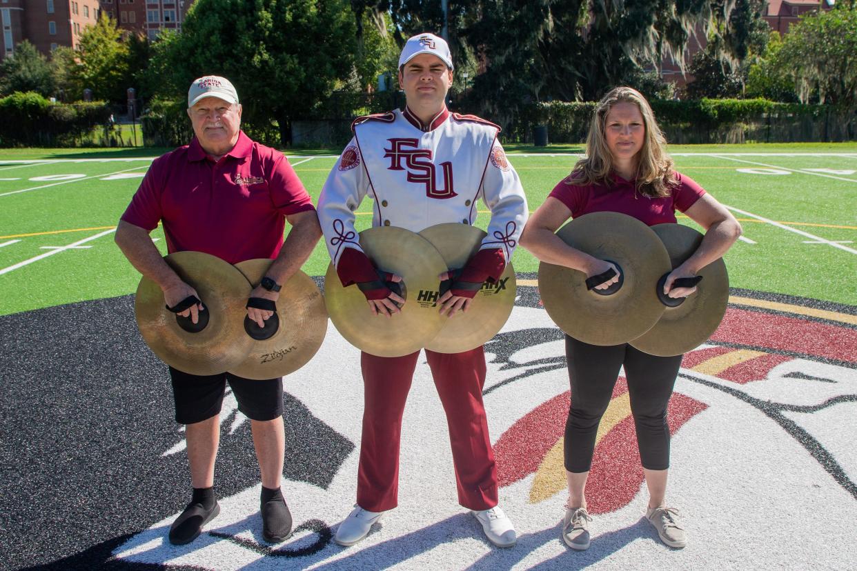 Three generations of Marching Chiefs Lewis Christie, left, his grandson, Aidan Wester, center, and daughter, Carla Christie-Wester, will perform together at the Florida State University homecoming game on Saturday, Oct. 21, 2023.