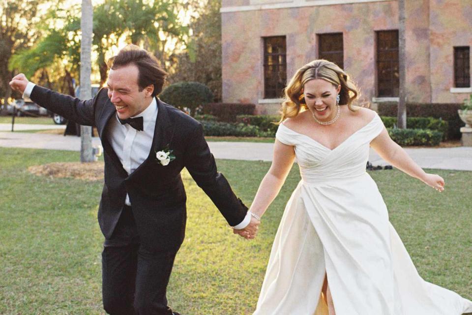 <p>Fox & Film Photography</p> Clayton Grimm and Bella Grimm smiling on their wedding day.