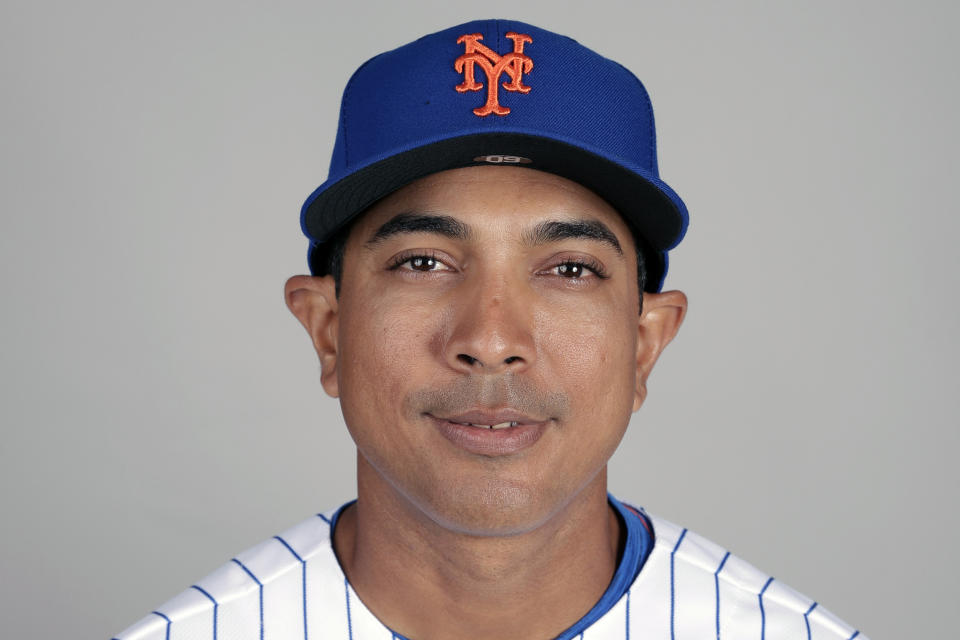 FILE - This is a 2019 photo showing Luis Rojas of the New York Mets baseball team. The New York Mets are finalizing a multiyear agreement with quality control coach Luis Rojas to make him the team’s new manager, general manager Brodie Van Wagenen said Wednesday, Jan. 22, 2020. Rojas would replace Carlos Beltrán, who left the team last week before managing a single game as part of the fallout from the Houston Astros' sign-stealing scandal. (AP Photo/John Raoux, File)