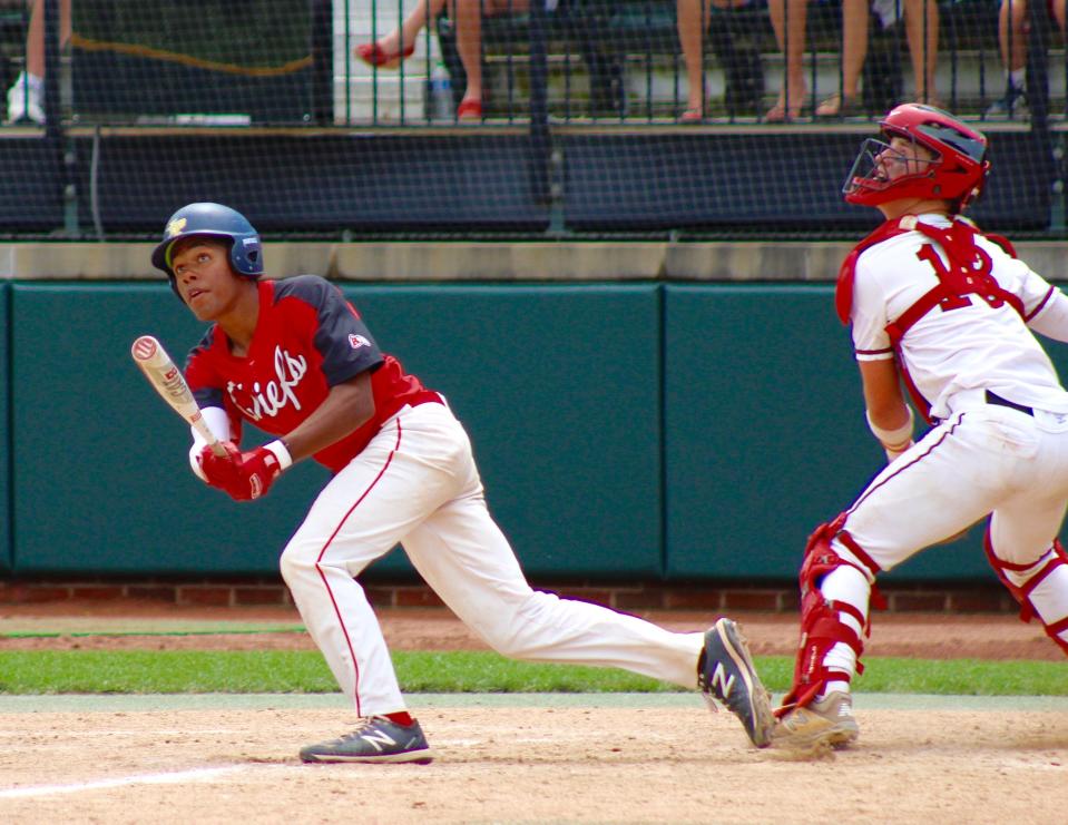 Matthew Williams of New Boston Huron swings at a pitch against Orchard Lake St. Mary's in the Division 2 state semifinals last season.