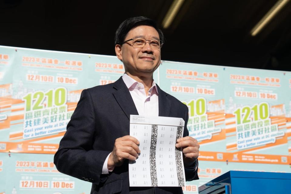 Hong Kong Chief Executive John Lee casts his vote for the District Council Ordinary Election in Hong Kong (EPA)