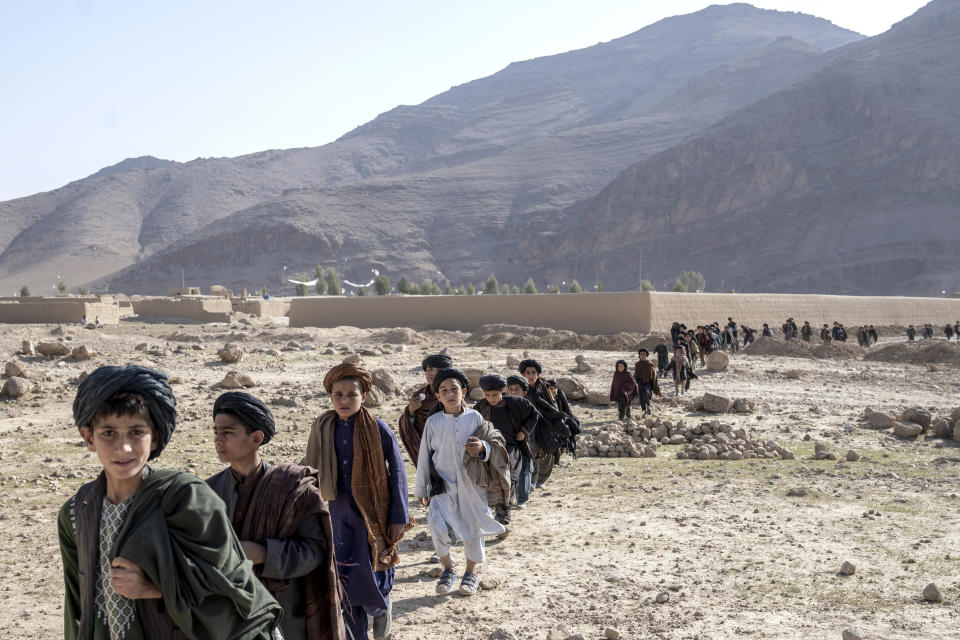 Boys participate in celebrations for completing their religious studies in Afghanistan, on Saturday, Feb. 25, 2023. (AP Photo/Ebrahim Noroozi)