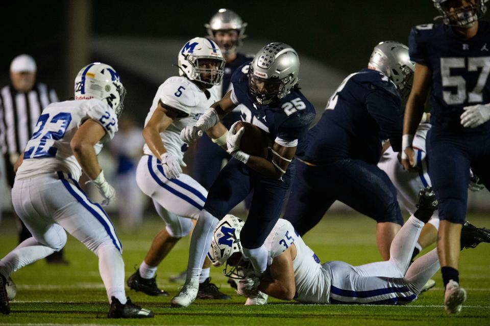 Reitz’s Jasseum Ussery (25) runs the ball as the Reitz Panthers play the Memorial Tigers at the Reitz Bowl in Evansville, Ind., Friday Sept. 29, 2023.