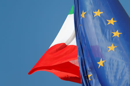 European Union and Italian flags are seen in downtown Rome, Italy, October 19, 2018. REUTERS/Alessandro Bianchi