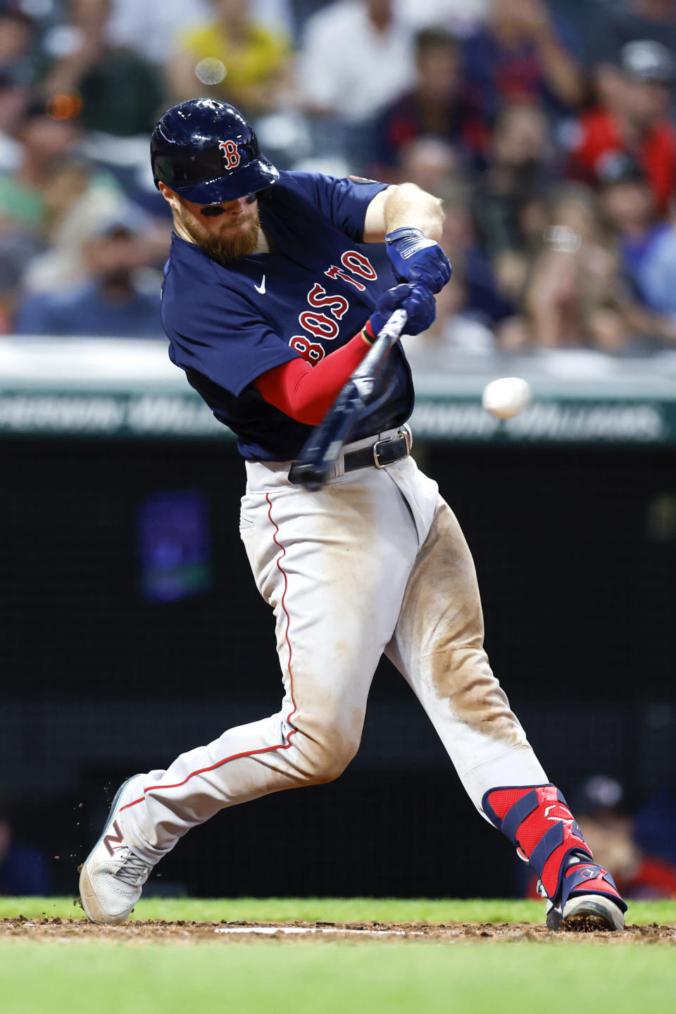 Boston Red Sox's Christian Arroyo hits a two-run home run against the Cleveland Guardians during the seventh inning of a baseball game Friday, June 24, 2022, in Cleveland. (AP Photo/Ron Schwane)