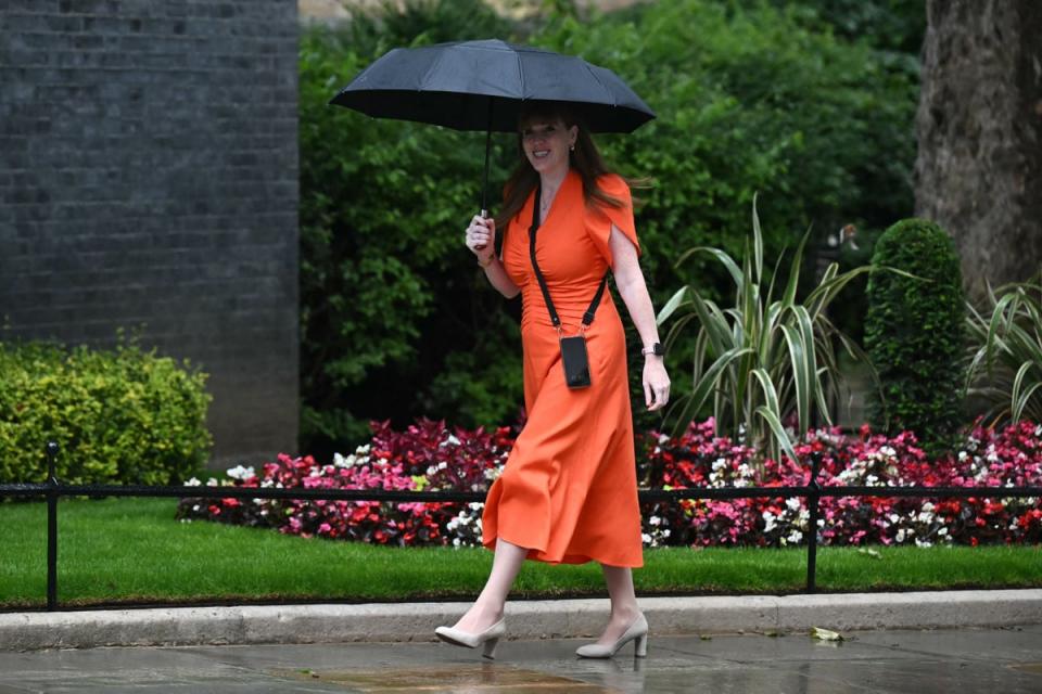 Pocket poverty: Angela Rayner sports a black phone strap on her way to a cabinet meeting (AFP via Getty)